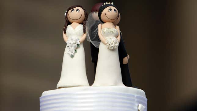Two bride figurines adorn the top of a wedding cake for a 2009 ceremony to protest Australian lawmakers’ failure to end the gay marriage ban.
