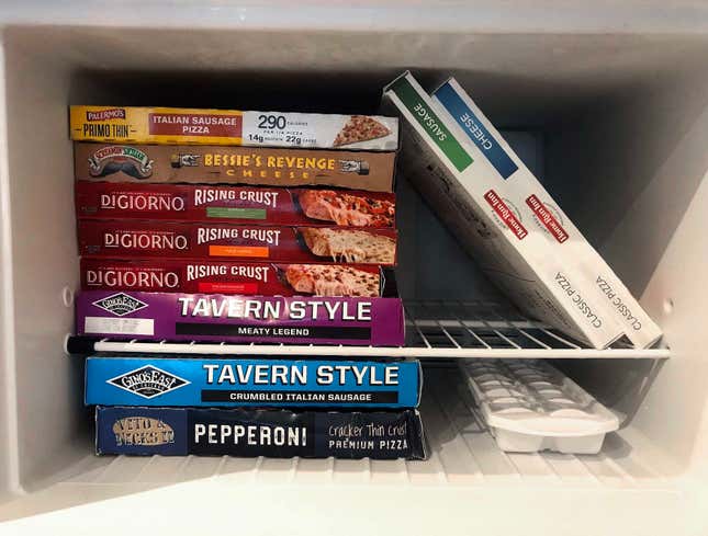 Image for article titled Frozen Pizza Boxes Ostentatiously Displayed By Spine Color