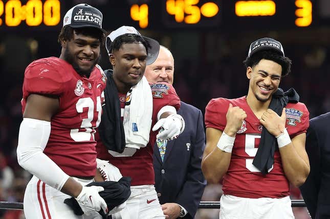 Alabama Crimson Tide linebacker Will Anderson Jr. (31) and quarterback Bryce Young (9) celebrate a victory with safety Jordan Battle (middle) against the Kansas State Wildcats in the 2022 Sugar Bowl at Caesars Superdome.