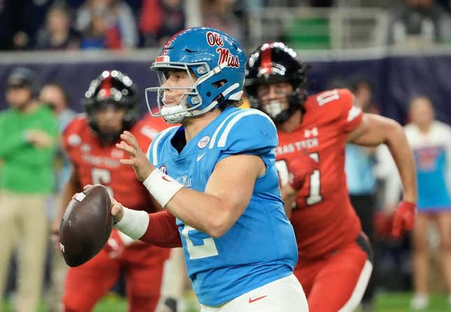 Dec 28, 2022; Houston, Texas, USA; Mississippi Rebels quarterback Jaxson Dart (2) scrambles from Texas Tech Red Raiders in the second half in the 2022 Texas Bowl at NRG Stadium.