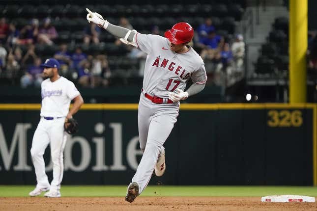 Jun 12, 2023; Arlington, Texas, USA; Los Angeles Angels designated hitter Shohei Ohtani (17) reacts as he rounds the bases after hitting a two run go ahead home run during the twelfth inning against the Texas Rangers at Globe Life Field.
