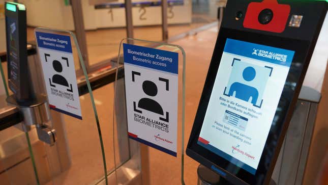 View of the biometric facial recognition system in front of a security checkpoint in the departure area of Hamburg Airport. 