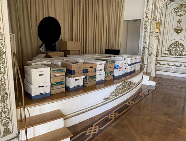 In this handout photo provided by the U.S. Department of Justice, stacks of boxes can be observed in the White and Gold Ballroom of former U.S. President Donald Trump's Mar-a-Lago estate in Palm Beach, Florida. Former U.S. President Donald Trump has been indicted on 37 felony counts in the special counsel's classified documents probe
