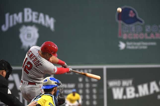 Apr 14, 2023; Boston, Massachusetts, USA; Los Angeles Angels right fielder Hunter Renfroe (12) hits an RBI double during the first inning against the Boston Red Sox at Fenway Park.
