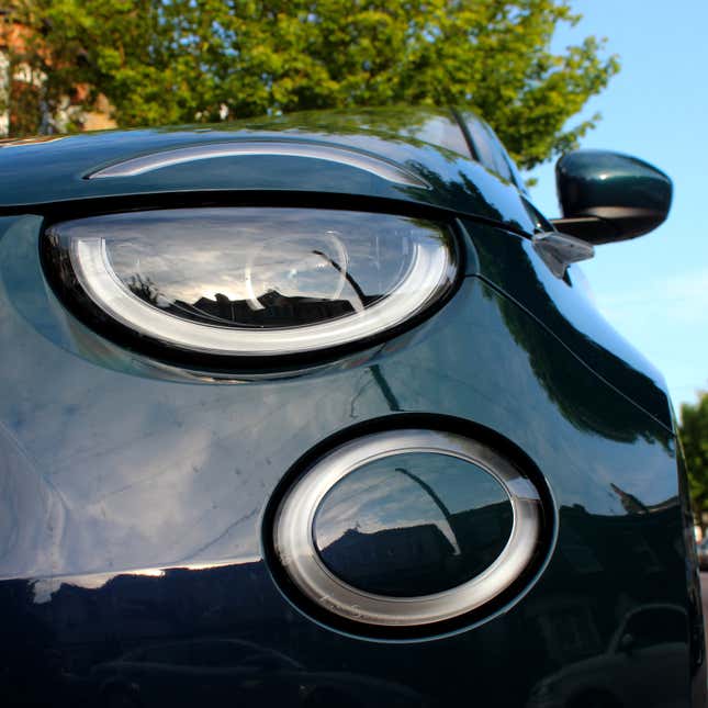 A photo of the headlights on the Fiat 500 EV. 