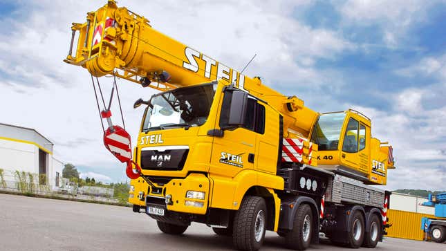 A yellow crane truck 