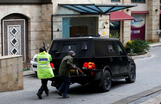 Members of security forces are seen at the scene where explosions and gunshots were heard at the Dusit hotel compound, in Nairobi, Kenya January 15, 2019.