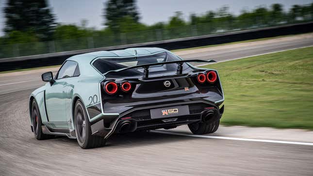 Rear view of the limited-edition Nissan GT-R50 by Italdesign on a racetrack.