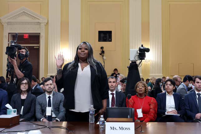 Wandrea ArShaye “Shaye” Moss, former Georgia election worker, is sworn in as her mother Ruby Freeman (in red) watches during the fourth hearing held by the Select Committee to Investigate the January 6 Attack on the U.S. Capitol on June 21, 2022, in the Cannon House Office Building in Washington, DC.