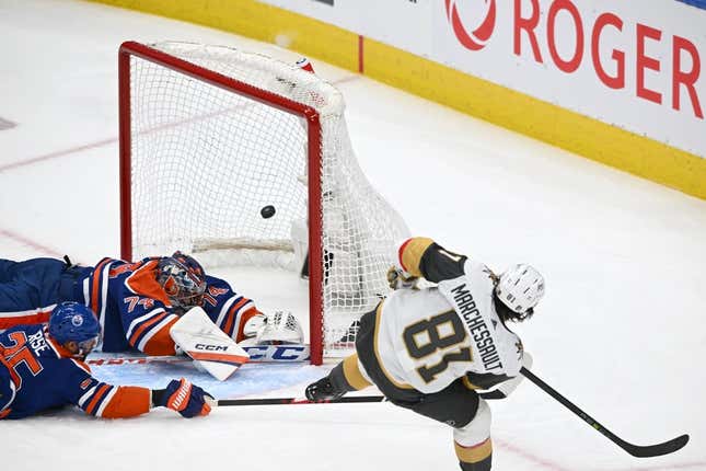 May 14, 2023; Edmonton, Alberta, CAN; Vegas Golden Knights right wing Jonathan Marchessault (81) shoots the puck as Edmonton Oilers goaltender Stuart Skinner (74) defenseman Darnell Nurse (25) attempt to block during the second period in game six of the second round of the 2023 Stanley Cup Playoffs at Rogers Place.