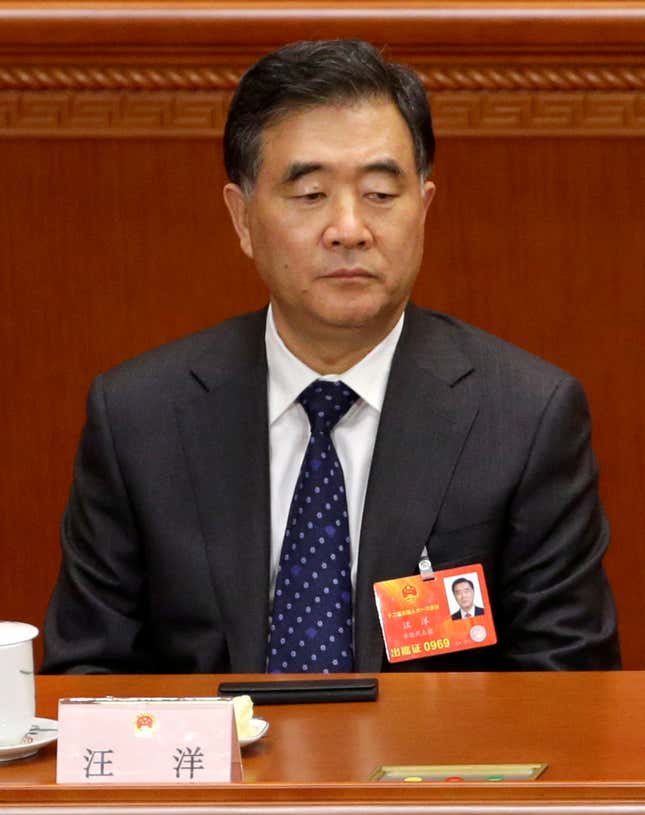 FILE PHOTO - China's newly-elected Vice Premier Wang Yang attends the sixth plenary meeting of the National People's Congress (NPC) at the Great Hall of the People, in Beijing March 16, 2013. REUTERS/Jason Lee/File Photo - RC1126C1F890