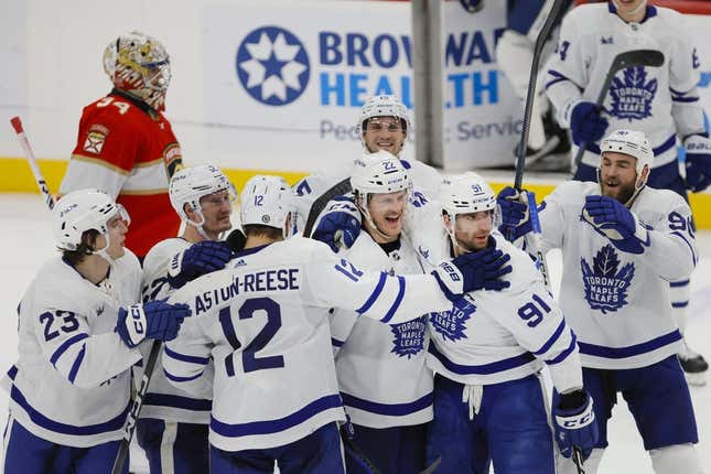 Apr 10, 2023; Sunrise, Florida, USA; Toronto Maple Leafs center John Tavares (91) celebrates with defenseman Jake McCabe (22), center Zach Aston-Reese (12), left wing Matthew Knies (23), center Noel Acciari (52), and center Ryan O&#39;Reilly (90) after scoring the game-winning goal during overtime against the Florida Panthers at FLA Live Arena.
