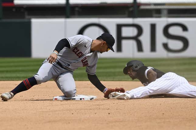 May 18, 2023; Chicago, Illinois, USA; Chicago White Sox shortstop Tim Anderson (7) is caught stealing by Cleveland Guardians second baseman Andres Gimenez (0) during the third inning at Guaranteed Rate Field.