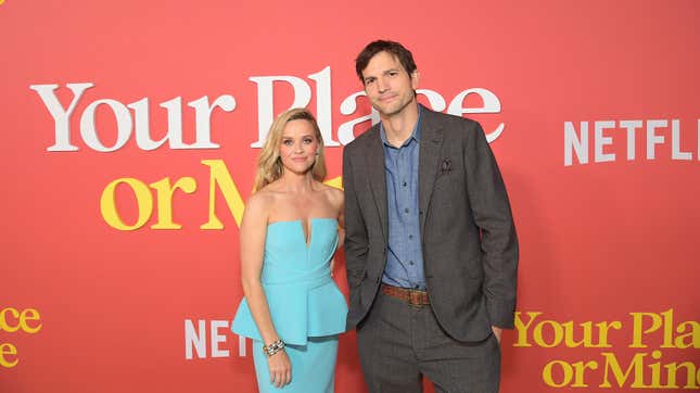 Reese Witherspoon and Ashton Kutcher in one of the infamous red carpet photos