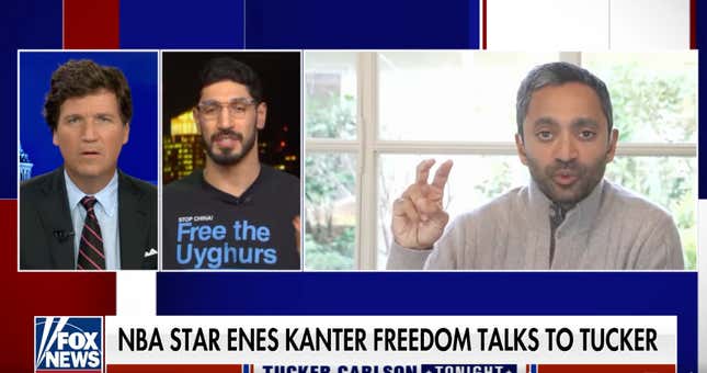 Tucker Carlson (l.) makes his signature “bemused and constipated” face as he speaks to the NBA’s Enes Kanter Freedom (c.).