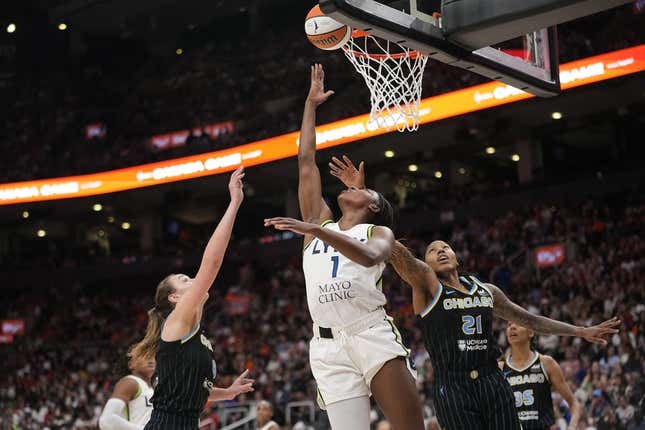 May 13, 2023; Toronto, Ontario, Canada; Minnesota Lynx forward Diamond Miller (1) goes to make a basket against Chicago Sky forward Robyn Parks (21) and forward Alanna Smith (8) during the second half at Scotiabank Arena.