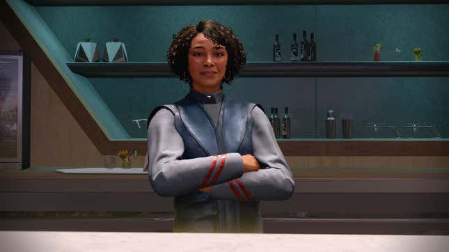 Nyssa, the bartender at The Viewport, stands behind the bar with her arms folded and a smile on her face.