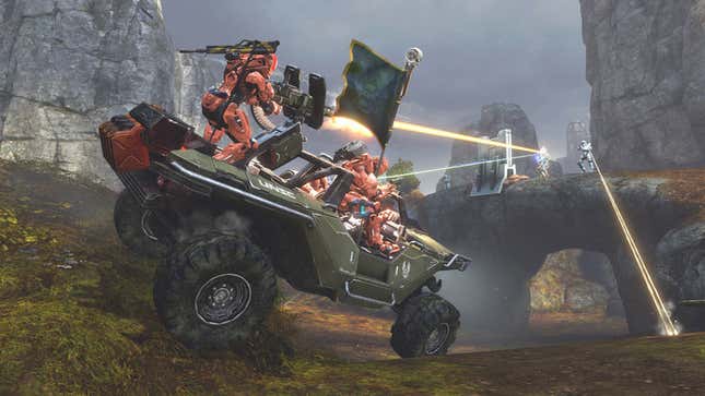 Spartans race in a warthog, carrying the enemy flag as they're fired upon.