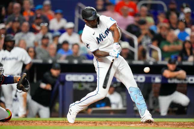 Aug 14, 2023; Miami, Florida, USA; Miami Marlins designated hitter Jorge Soler (12) hits a home run against the Houston Astros during the eighth inning at loanDepot Park.