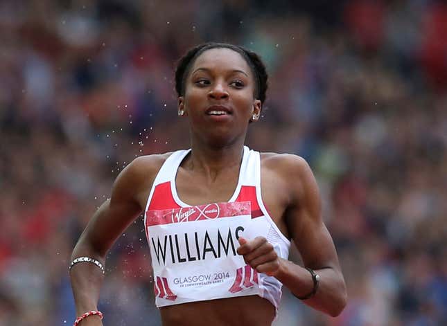 Bianca Williams, left of England looks to her left as she wins her semifinal of the women’s 200 meter race at Hampden Park Stadium during the Commonwealth Games 2014 in Glasgow, Scotland, Thursday July 31, 2014.