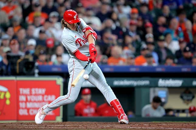 Apr 29, 2023; Houston, Texas, USA; Philadelphia Phillies third baseman Alec Bohm (28) hits an RBI double to right field against the Houston Astros during the eighth inning at Minute Maid Park.