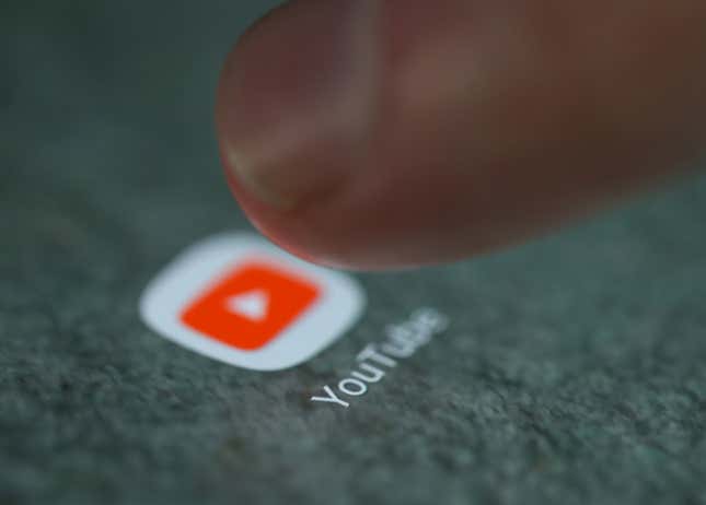 The YouTube app logo is seen on a smartphone in this picture illustration taken September 15, 2017. REUTERS/Dado Ruvic/Illustration – RC1F9FACE150