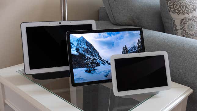 The Google Pixel Tablet sitting next to the Google Nest Hub and the Google Nest Hub Max.