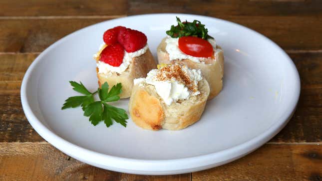 Three slices of baguette topped with Homemade Ricotta