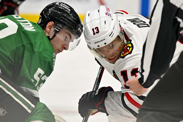 Feb 22, 2023; Dallas, Texas, USA; Dallas Stars center Wyatt Johnston (53) and Chicago Blackhawks center Max Domi (13) take the face-off in the Stars zone during the third period at the American Airlines Center.