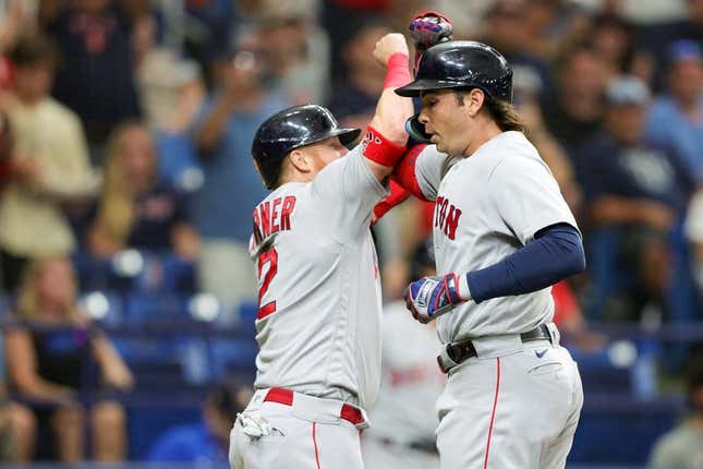Sep 4, 2023; St. Petersburg, Florida, USA;  Boston Red Sox designated hitter Justin Turner (2) congratulates first baseman Triston Casas (36) after hitting a there-run home run against the Tampa Bay Rays in the sixth inning at Tropicana Field.