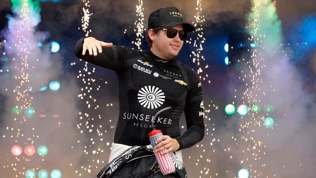 Noah Gragson, driver of the #42 Sunseeker Resort Chevrolet, walks onstage during driver intros prior to the NASCAR Cup Series Cook Out 400 at Richmond Raceway on July 30, 2023 in Richmond, Virginia.