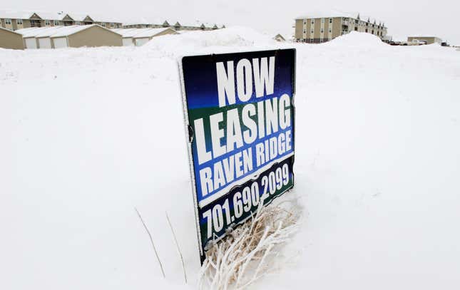 A sign advertises apartments for rent in Dickinson, North Dakota January 21, 2016. Low oil prices have forced rents down across North Dakota's Bakken oil field, as many workers have lost their jobs or left the industry. The collapse of U.S. oil and gas investment could have further to fall and Americans are showing signs they spend less of their windfall from lower gasoline prices than in the past, darkening the outlook for the U.S. economy.