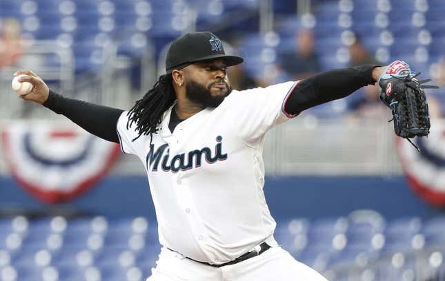 Apr 3, 2023; Miami, Florida, USA; Miami Marlins starting pitcher Johnny Cueto (47) pitches against the Minnesota Twins during the first inning at loanDepot Park.