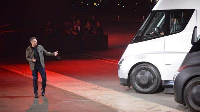 Elon Musk stands in front of a Tesla semi truck in 2017.