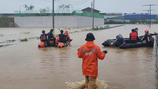 A rescue operation is under way on a submerged underground road in Cheongju, South Korea, Saturday, July 15, 2023.