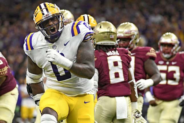 Sep 4, 2022; New Orleans, Louisiana, USA; Louisiana State Tigers defensive tackle Maason Smith (0) celebrates a play during the first half against the Florida State Seminoles at Caesars Superdome.