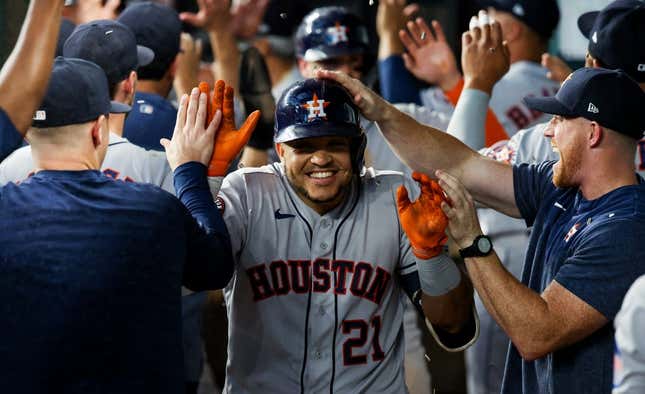 Sep 4, 2023; Arlington, Texas, USA; Houston Astros catcher Yainer Diaz (21) celebrates with teammates after hitting a three-run home run during the seventh inning against the Texas Rangers at Globe Life Field.
