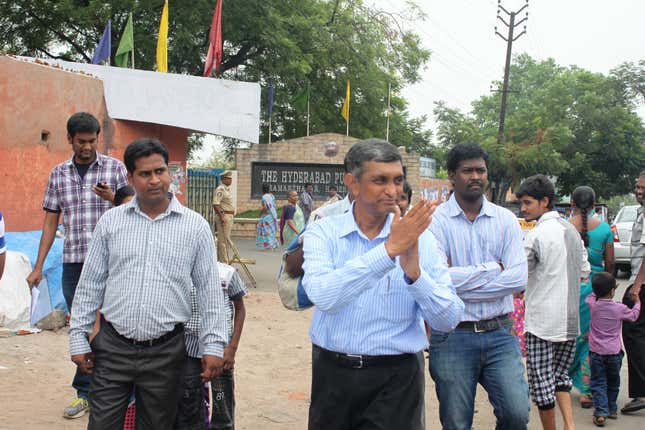 Lok Satta Party’s Jayaprakash Narayan greeting voters at a polling booth in Malkajgiri.