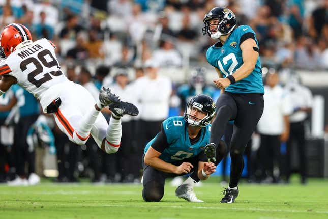 Aug 12, 2022; Jacksonville, Florida, USA; Jacksonville Jaguars place kicker Elliott Fry (12) kicks an extra point against the Cleveland Browns in the second quarter during preseason at TIAA Bank Field.