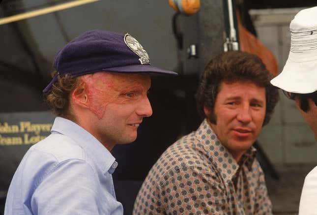 Two Pisces racers, Niki Lauda (left) and Mario Andretti (right) at the 1976 Italian Grand Prix.