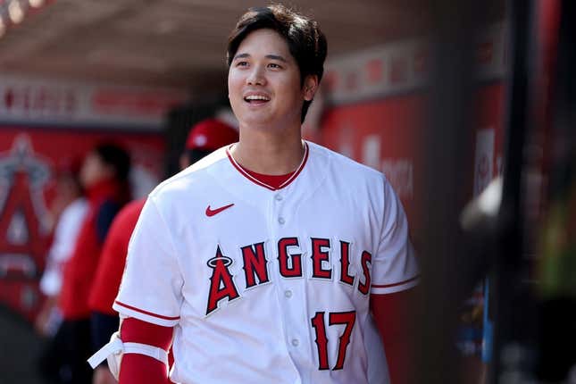 Oct 2, 2022; Anaheim, California, USA;  Los Angeles Angels designated hitter Shohei Ohtani (17) smiles in the dugout before the game against the Texas Rangers at Angel Stadium.