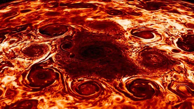 This image from the Juno spacecraft shows the nine cyclones at Jupiter’s north pole in infrared.