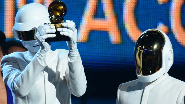 Daft Punk accept award for Album of the Year during the 56th GRAMMY Awards on January 26, 2014
