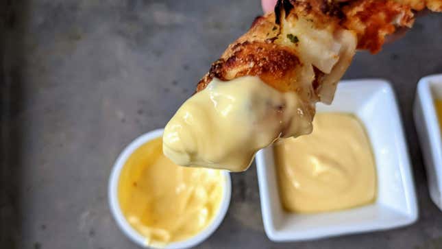 crust dipped in garlic sauce