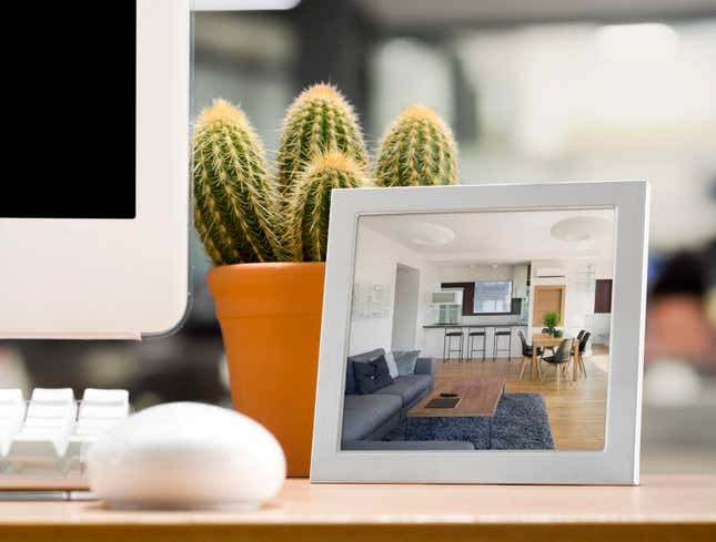 Image for article titled Worker Keeps Photo Of Empty Apartment On Desk To Remind Him Why He Stays Late