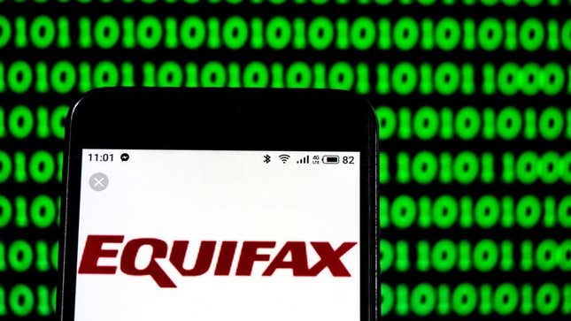 The Equifax logo on a phone, superimposed on a background of one's and zero's.