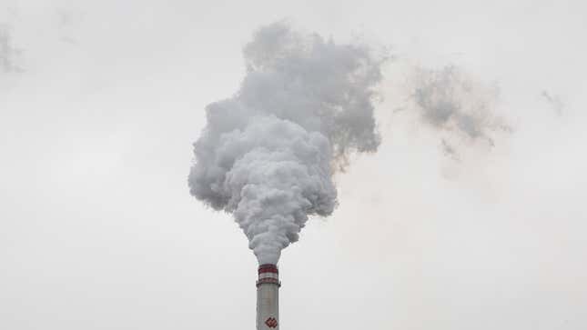 The chimney of a coal fired power plant is seen on October 13, 2021 in Hanchuan, Hubei province, China.