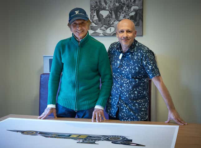 Artist Alan Thornton, right, and Emerson Fittipaldi.