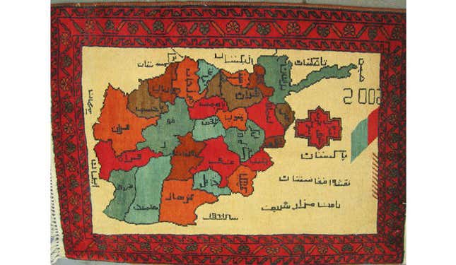 Image for article titled Afghan carpet weavers are putting drones on their rugs