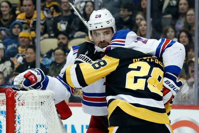 Mar 12, 2023; Pittsburgh, Pennsylvania, USA;  New York Rangers left wing Chris Kreider (20) and Pittsburgh Penguins defenseman Marcus Pettersson (28) after a second period stoppage in play at PPG Paints Arena.